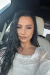 Car selfie of brunette escort Nina 
