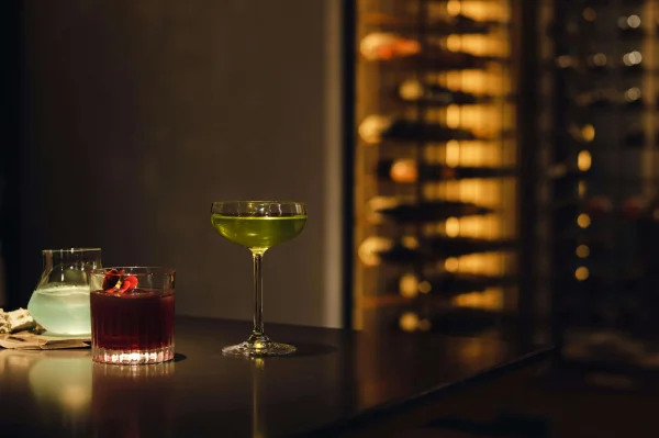 a few cocktails on a table at a London bar