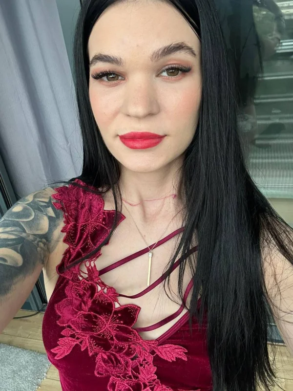 A very close up selfie of a very sexy brunette escort called Carina 