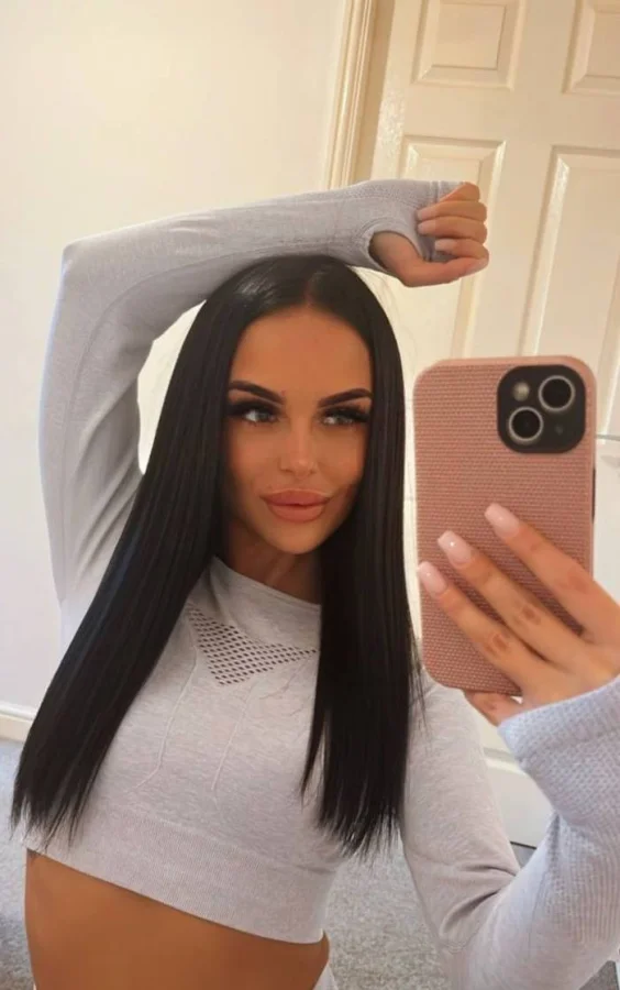 Selfie of Shanel in a white top 