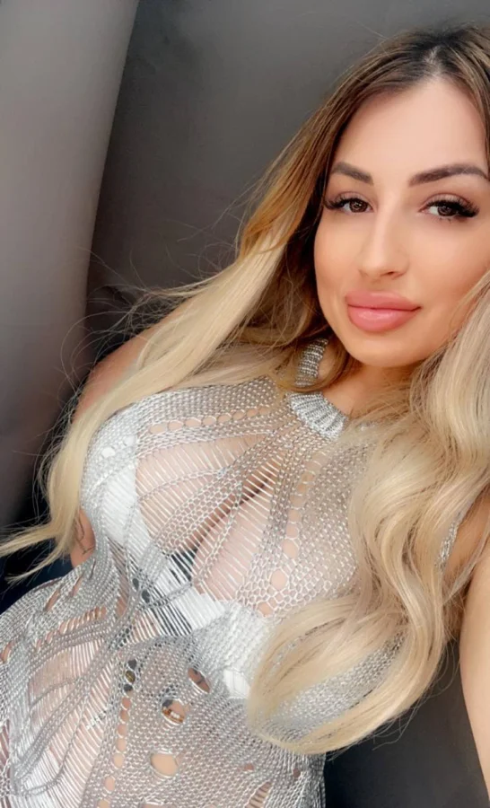 Storms boobs are busting out of her top in this selfe