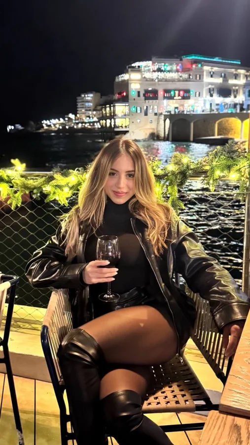 Gabriella is dressed in black 
