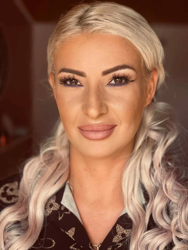 A blonde escort with a lovely smile 
