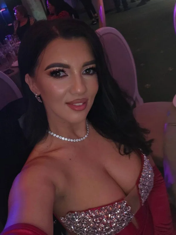 Lady lady wearing a low cut dress 