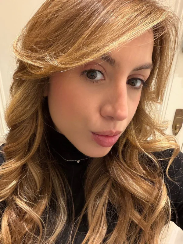 A very close up photo of a beautiful blonde escort named Gabriela 