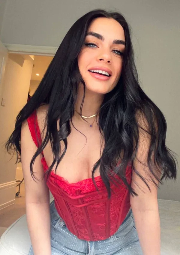 A lady posing while taking a selfie 