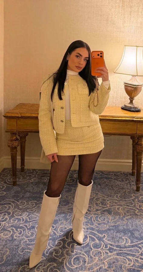 Blossom is wearing a white outfit for an outcall to a London hotel 
