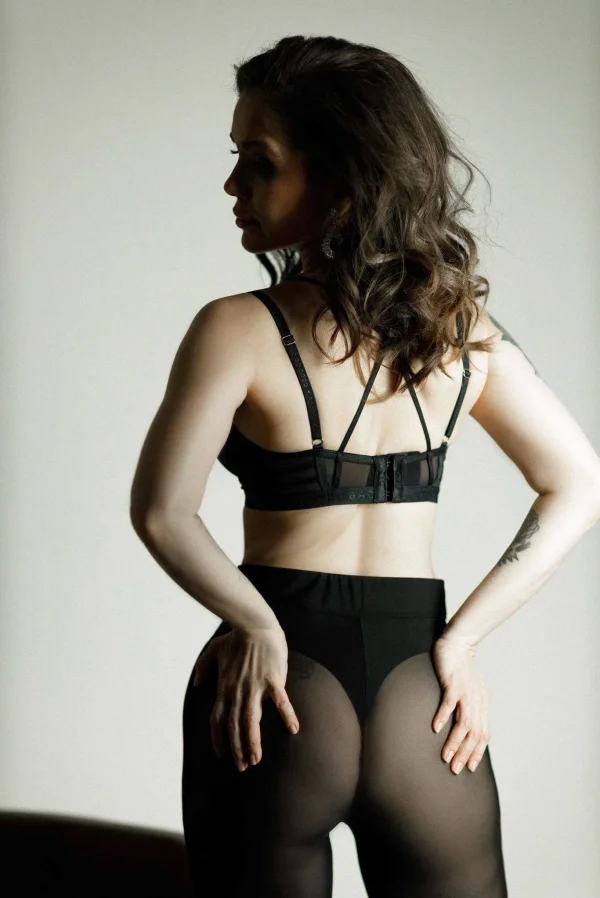 Millena pictured wearing black lingerie 