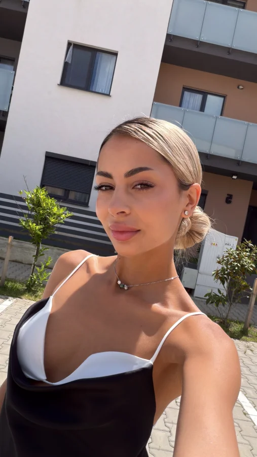 Blonde London escort Dasha out in the sun 