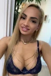 A selfie of a slim blonde escort in blue underwear 